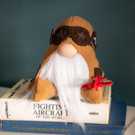 Load image into Gallery viewer, Gnome with goggles and a beard sitting on books against a dark background
