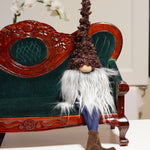 Load image into Gallery viewer, Brown fall gnome with long legs and boots sitting on a couch
