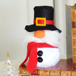 Load image into Gallery viewer, Snowman bookend with top hat and scarf on a wooden surface next to two old books.
