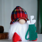 Load image into Gallery viewer, Gnome figurine with a plaid hat and green tool box on a surface.
