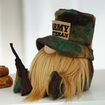 Load image into Gallery viewer, Gnome figurine wearing an Army Veteran hat with books in the background

