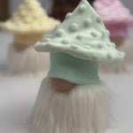 Load image into Gallery viewer, Small mint mushroom gnome figurine with a textured mushroom hat with a white beard on a white table.
