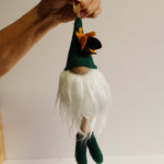 Load image into Gallery viewer, Hand holding a toy duck against a plain background
