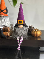 Load image into Gallery viewer, Two Halloween-themed gnomes with purple hats and striped socks on a wooden surface. Idea for cute Halloween home decor
