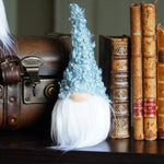 Load image into Gallery viewer, Decorative setup with a gnome, books, and a small tree on a dark surface.
