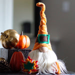 Load image into Gallery viewer, Orange Autumn gnome  sitting next to pumpkins
