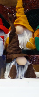 Load image into Gallery viewer, Two plush gnome dolls, perfect as handmade library guardians for your study or home office, with long white beards and tall hats in brown and yellow.

