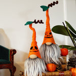 Load image into Gallery viewer, Decorative gnomes with pumpkins on a table in a room setting.
