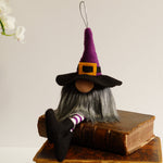 Load image into Gallery viewer, A colourful witch ornaments with purple hats, black outfits, and grey beards, designed for Halloween decoration.
