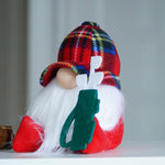 Load image into Gallery viewer, Plush golfer gnome featuring a colourful hat and holding a miniature golf club against a neutral background.
