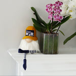 Load image into Gallery viewer, best dog mom gnome on fireplace mantel next to an orchid
