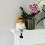 Load image into Gallery viewer, Decorative gnome with a hat, potted plants on a white surface.
