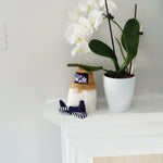Load image into Gallery viewer, Gnome with tan baseball cap  with best dog sitting on fireplace mantel with crossed leg

