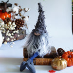 Load image into Gallery viewer, Gnome with a pointed hat surrounded by pumpkins and decorative items on a white surface
