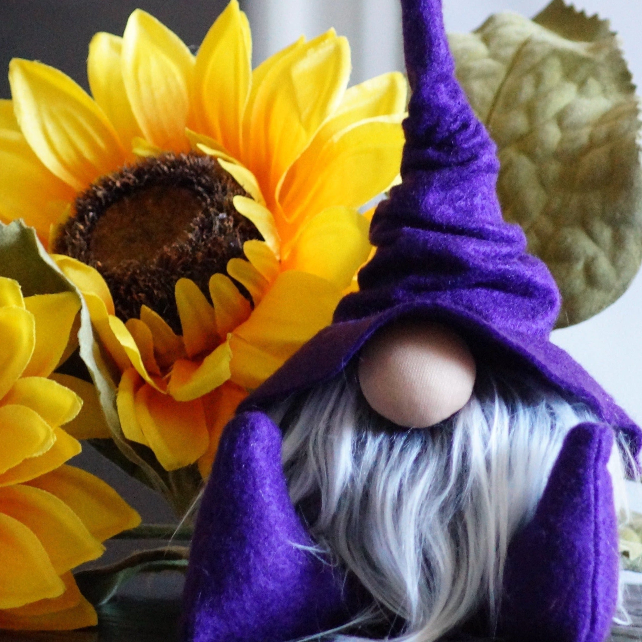 Purple scrunchy wizard hat gnome with a frosty beard