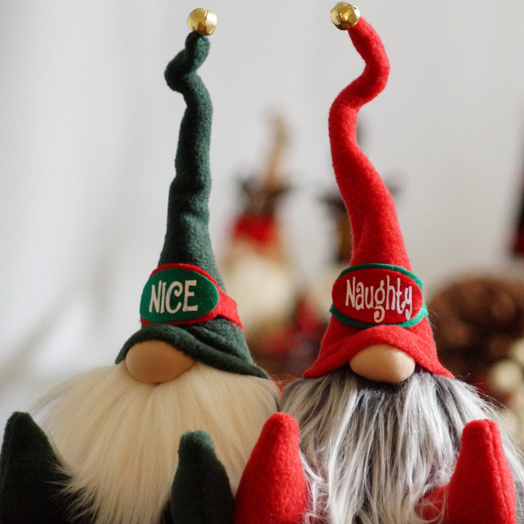 Two handmade holiday guardians: Naughty Nancy and Nice Nelson gnome dolls with long hats—perfect Christmas décor for your shelf.