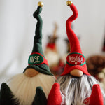 Load image into Gallery viewer, Two handmade holiday guardians: Naughty and Nice  gnome dolls with long hats—perfect Christmas décor for your shelf.
