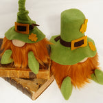 Load image into Gallery viewer, St Patrick's day gnome and  leprechaun gnome otherwise know as the Irish Lad sitting together on top of a stack of books.
